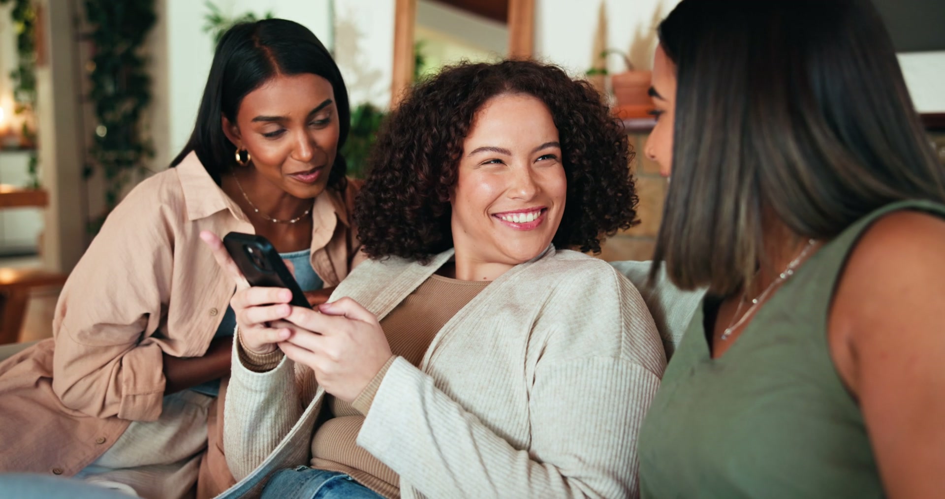 Three friends sharing a trusted recommendation